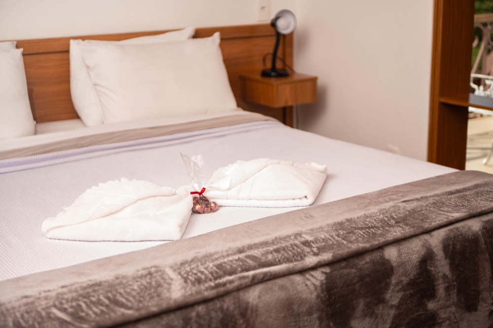 Cama de casal do Apartamento Deluxe